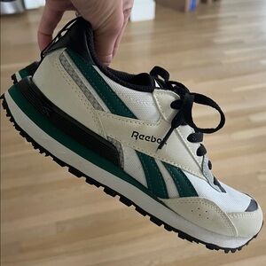 Like new Reebok. White and Black Athletic Sneakers with Green Accent.